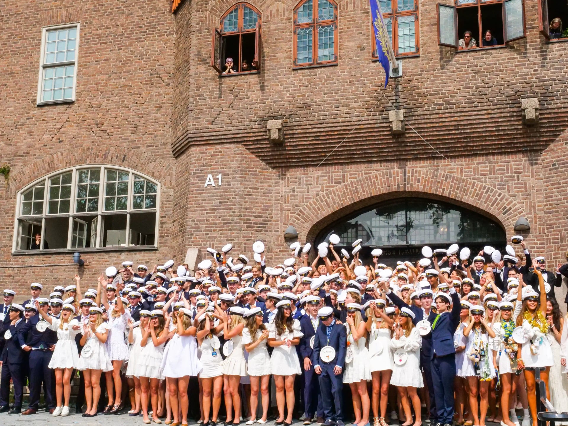 Studenter som firar sin examen